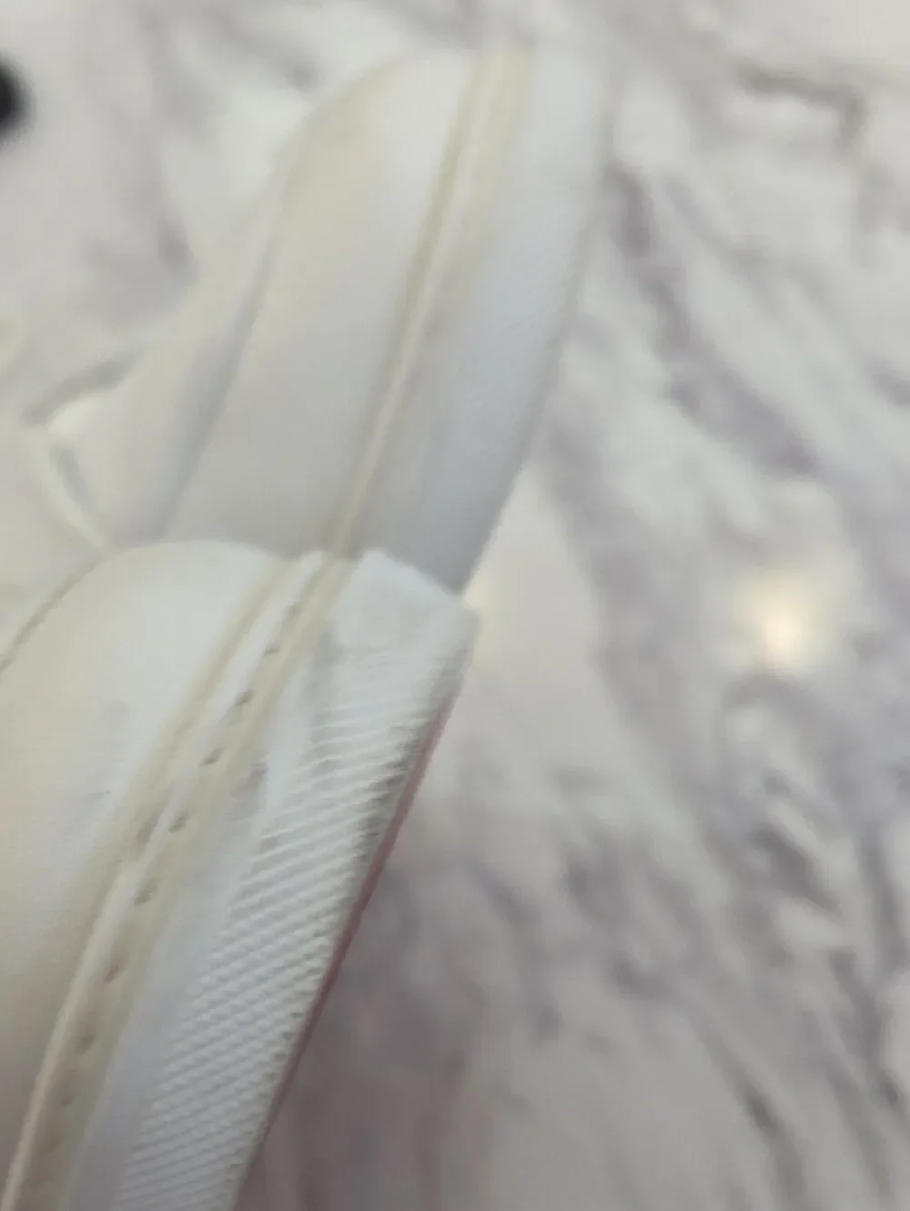 Christian Louboutin White Low-Top Leather Sneakers with Red Heel Accent